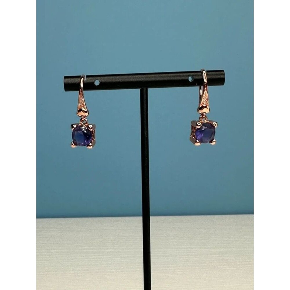 Rose gold tone earrings with purple stone NWOT